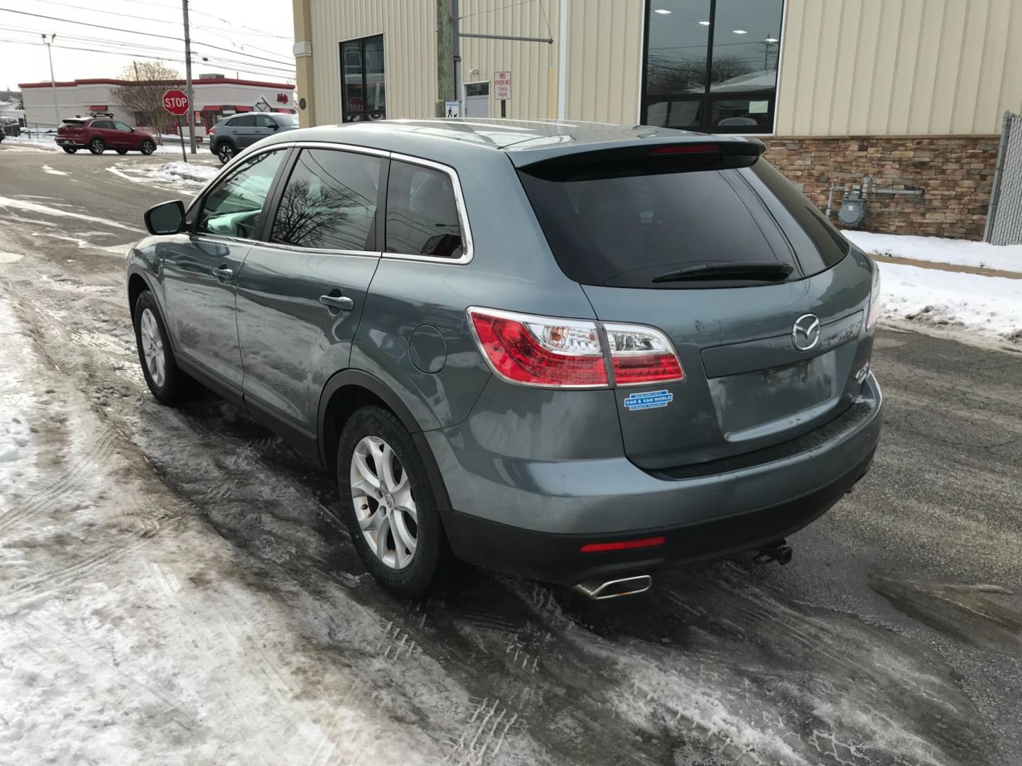 2012 Green /Tan Mazda CX-9 Sport (JM3TB3BV4C0) with an 3.7 V6 engine, Automatic transmission, located at 577 Chester Pike, Prospect Park, PA, 19076, (610) 237-1015, 39.886154, -75.302338 - Photo#4